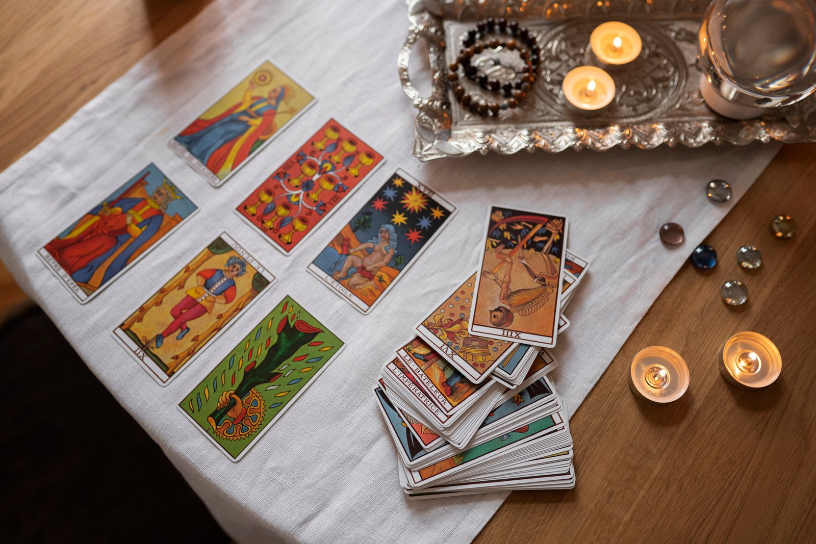 high-angle-tarot-cards-arrangement-table